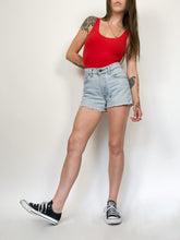 Load image into Gallery viewer, Vintage 90s Levis Light Wash Cut Off Jean Shorts Waist 28”