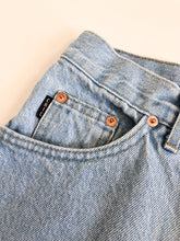 Load image into Gallery viewer, Vintage 90s Chic Light Wash High Rise Raw Hem Jeans Waist 28”