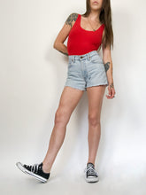 Load image into Gallery viewer, Vintage 90s Levis Light Wash Cut Off Jean Shorts Waist 28”
