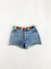 Load image into Gallery viewer, Vintage Y2K ‘Next Issue’ Rainbow Peace Sign Denim Shorts Waist 29/30”
