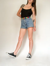 Load image into Gallery viewer, Vintage Y2K ‘Next Issue’ Rainbow Peace Sign Denim Shorts Waist 29/30”

